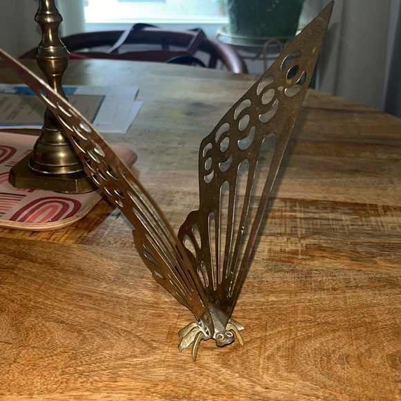 Brass butterfly sits upright on a table. Gorgeous wings and in great condition. - Picture 2 of 3